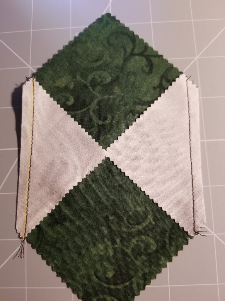Xs and Os block before pressing and after trimming the white pieces.