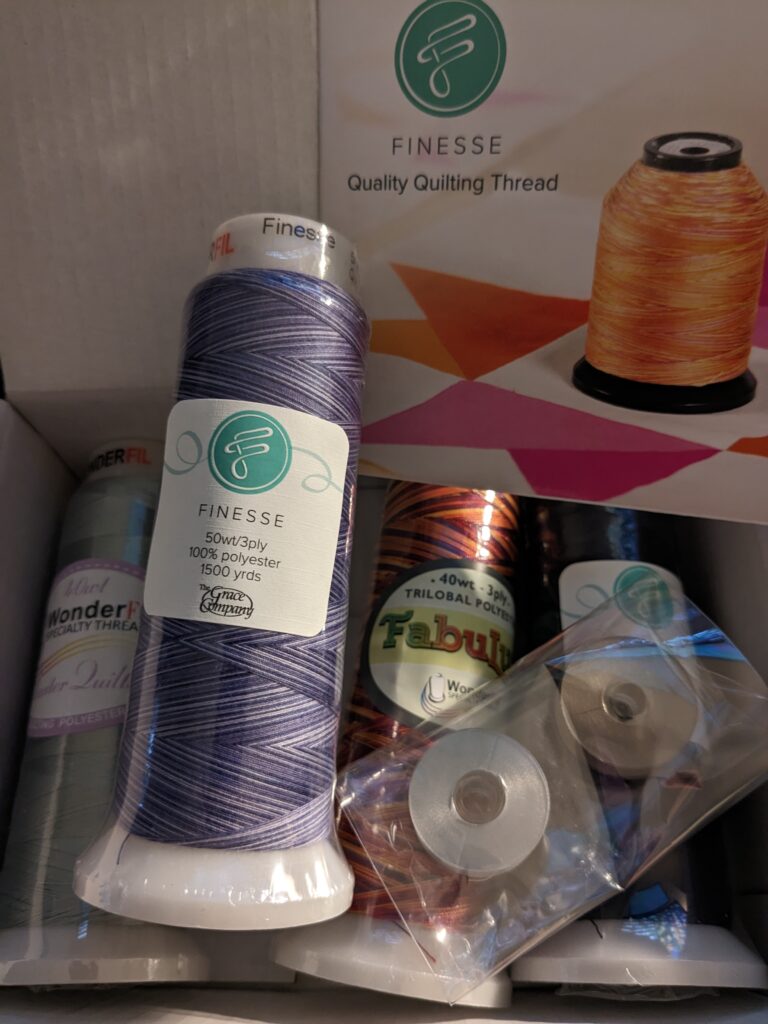 The box of Finesse thread samples that came with the 19x Elite.