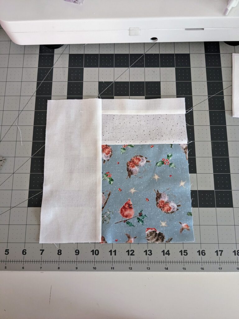 Piece EFG sewn to piece H.